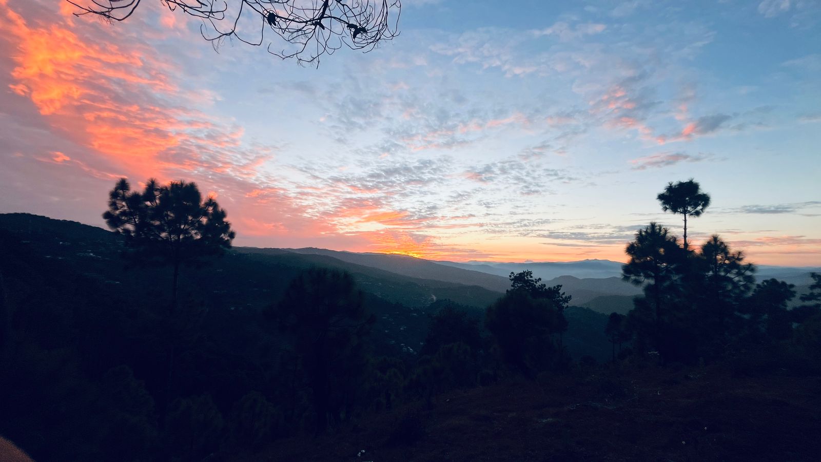 Vibrant orange clouds at dusk
