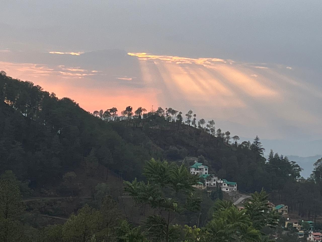 Dramatic sun rays over Ranikhet hills
